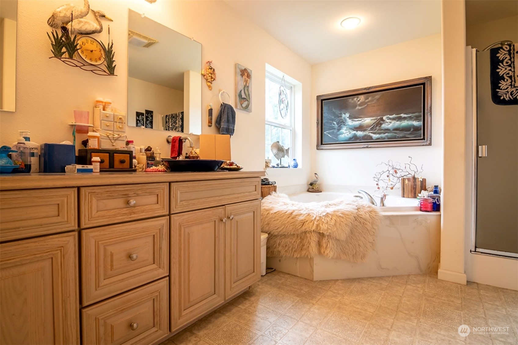 11 Condra Road Copalis Beach, WA 98535 - Photo 13 of 24 a living room with furniture and a mirror