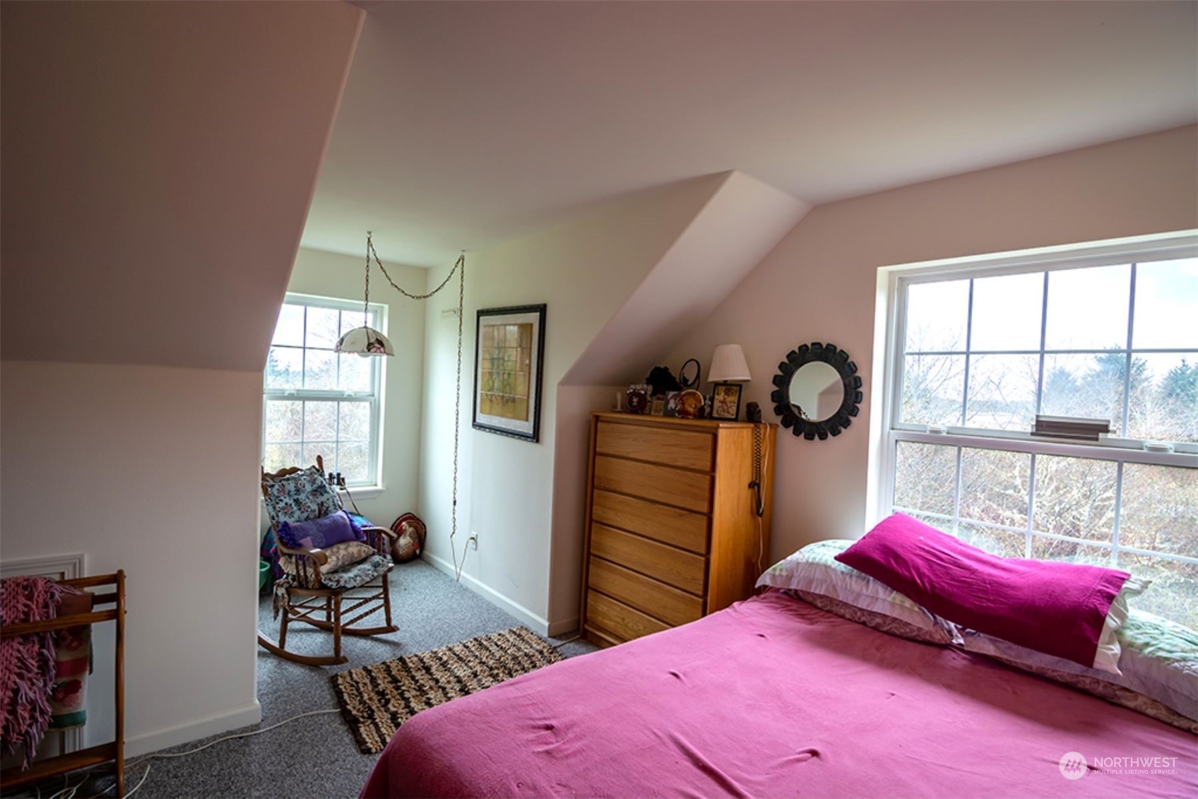 11 Condra Road Copalis Beach, WA 98535 - Photo 16 of 24 a bedroom with two beds and a large window