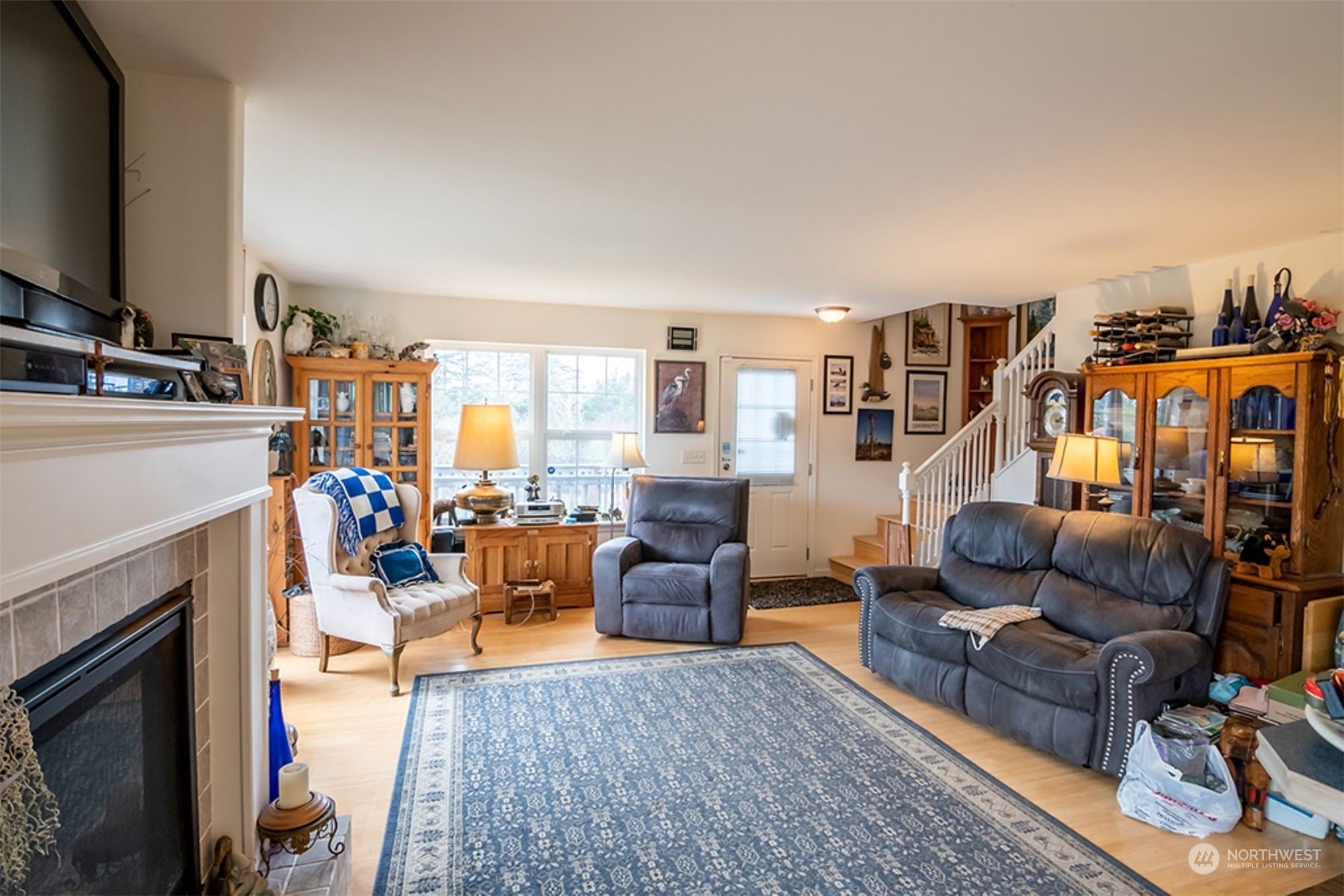 11 Condra Road Copalis Beach, WA 98535 - Photo 8 of 24 a living room with furniture and a fireplace