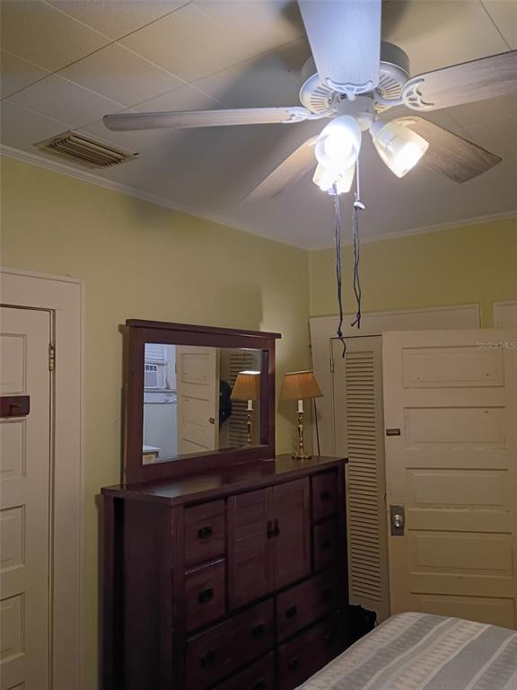 513 West Main Street Wauchula, FL 33873 - Photo 38 of 43 a room with wooden floor and chandelier