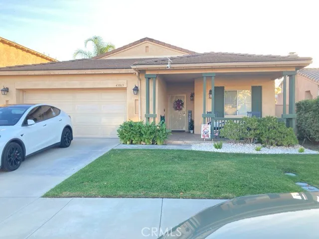 a view of a house with a garden