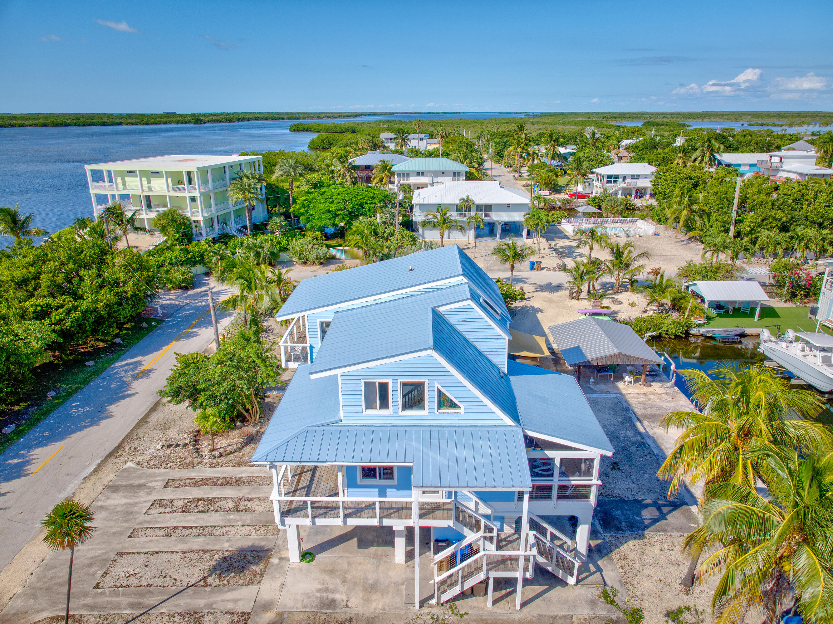 3831 Sunset Drive Big Pine Key, FL 33043 - Photo 7 of 59 an aerial view of a house with a yard