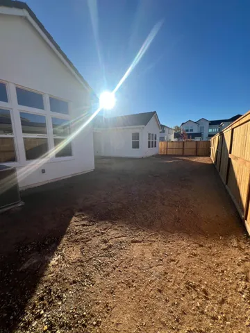 a view of a dirt road from a building