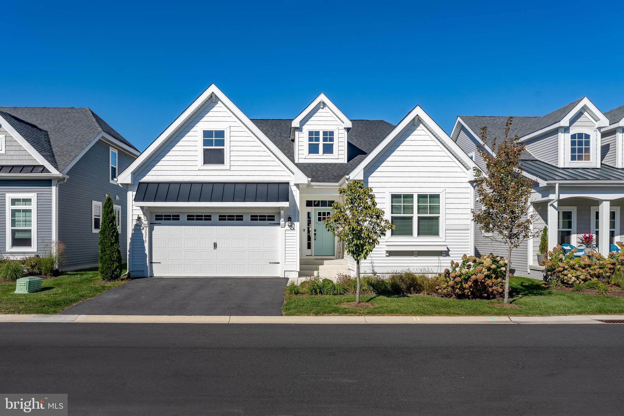 Charming modern home with inviting curb appeal.