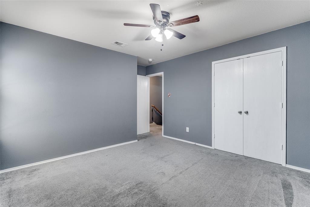 2541 Grand Gulf Road Fort Worth, TX 76123 - Photo 17 of 25 a view of an empty room with a fan