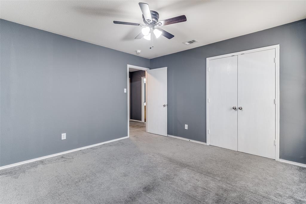 2541 Grand Gulf Road Fort Worth, TX 76123 - Photo 19 of 25 a view of an empty room and chandelier fan
