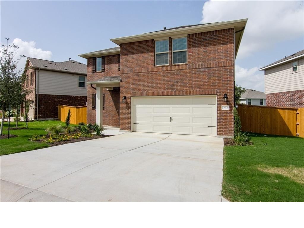 a house view with a backyard space