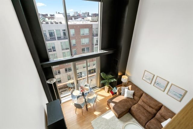 view of living room with furniture and window