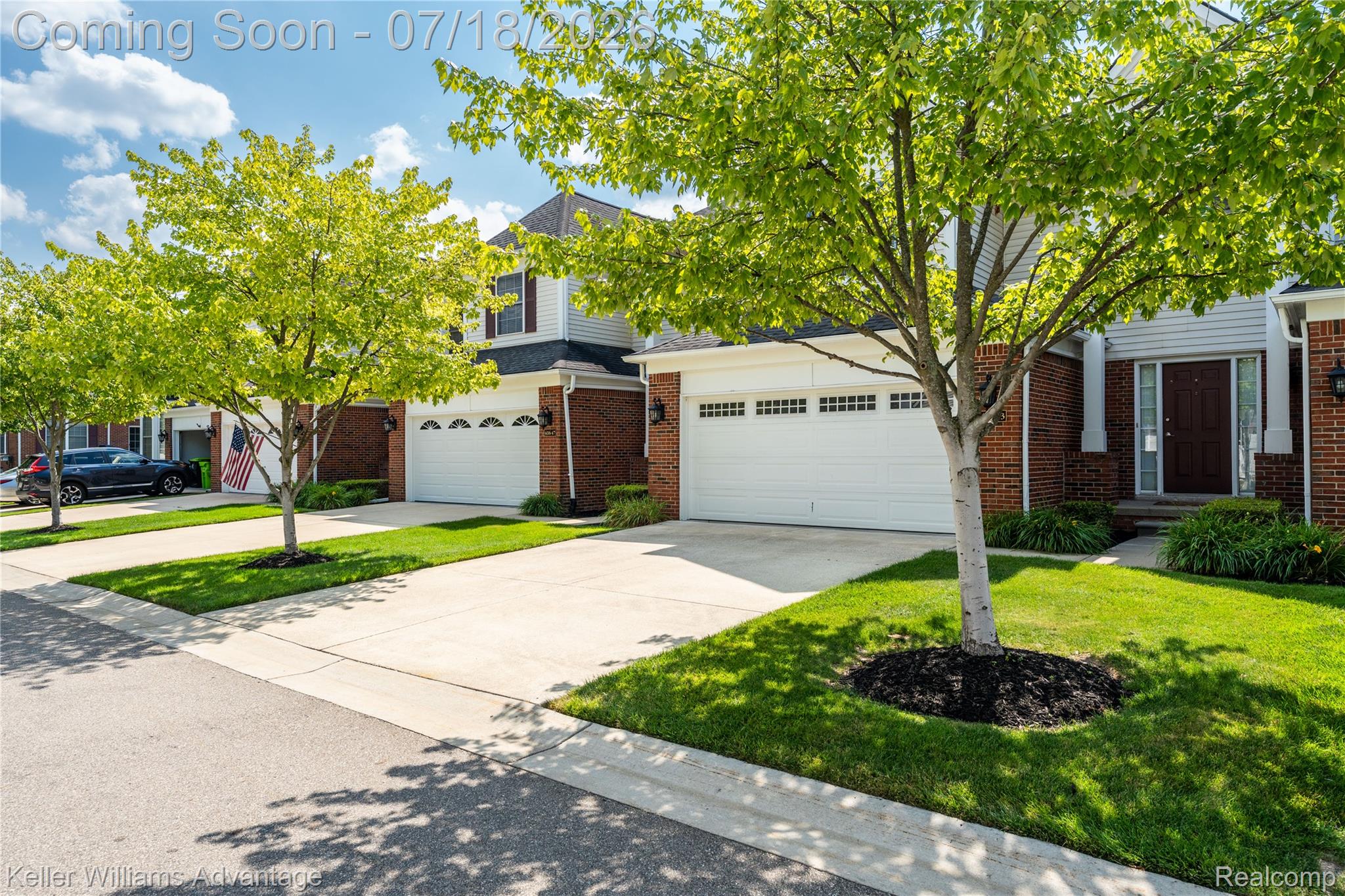41647 Mitchell Road Novi, MI 48377 - Photo 3 of 43 Brick and siding exterior featuring a covered entry