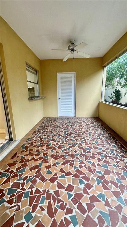1911 Northeast 28th Court, Unit 2B Lighthouse Point, FL 33064 - Photo 17 of 17 a bedroom with a bed and a window