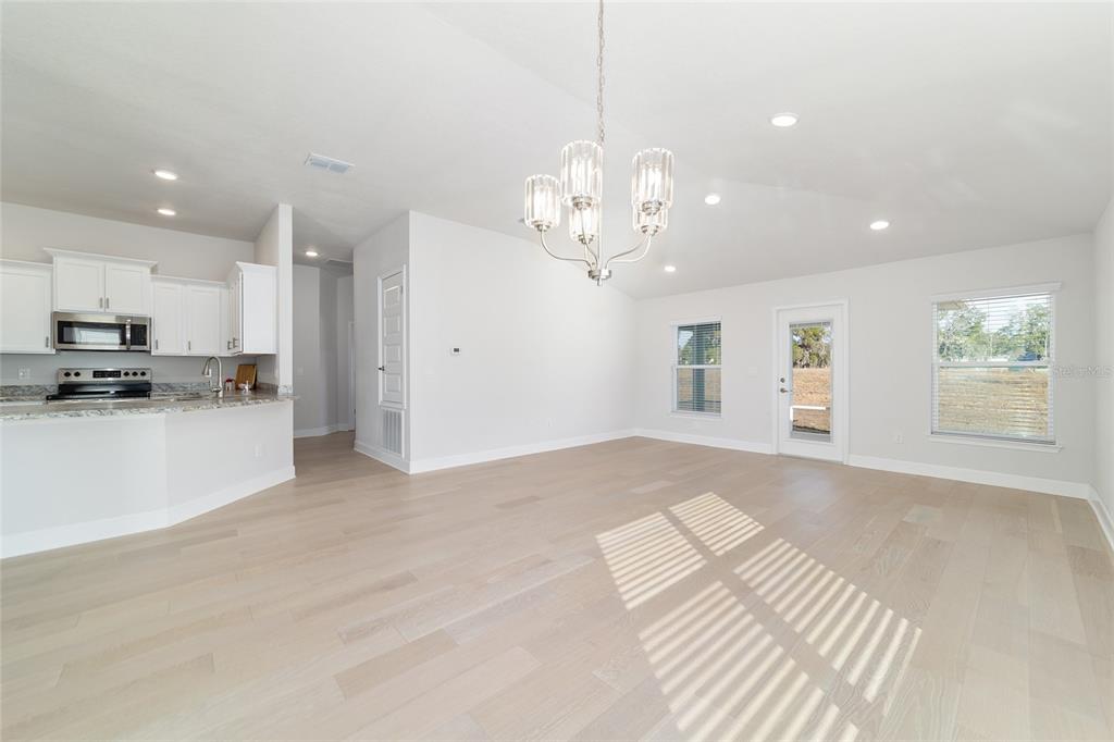 4373 Northeast 31st Street Ocala, FL 34470 - Photo 11 of 51 a view of a kitchen with a sink stainless steel appliances and cabinets
