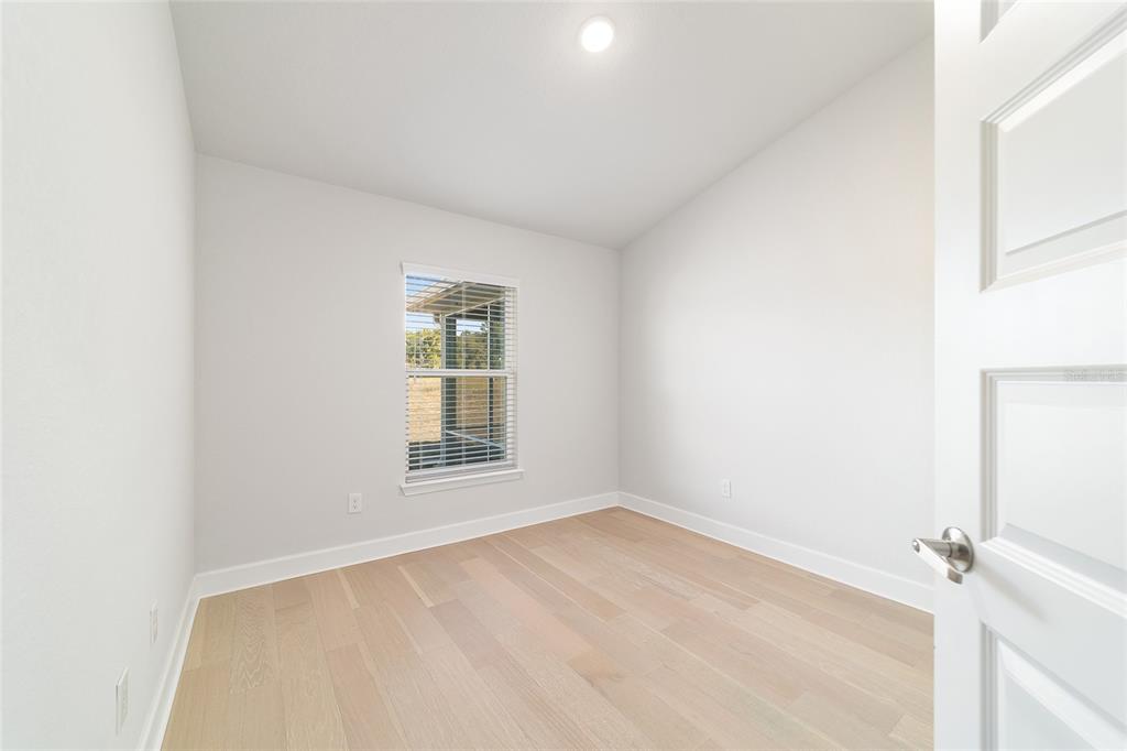 4373 Northeast 31st Street Ocala, FL 34470 - Photo 31 of 51 an empty room with a window