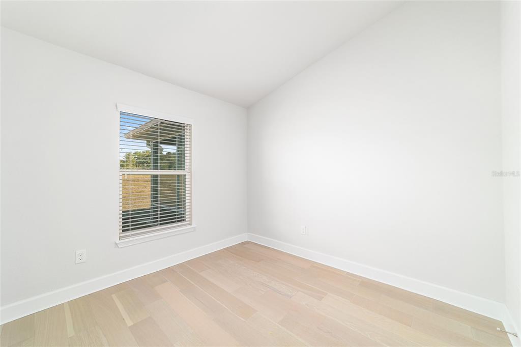 4373 Northeast 31st Street Ocala, FL 34470 - Photo 32 of 51 an empty room with a window