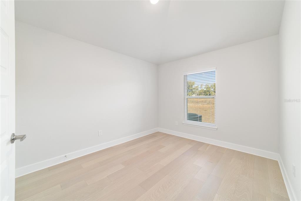 4373 Northeast 31st Street Ocala, FL 34470 - Photo 35 of 51 an empty room with a window