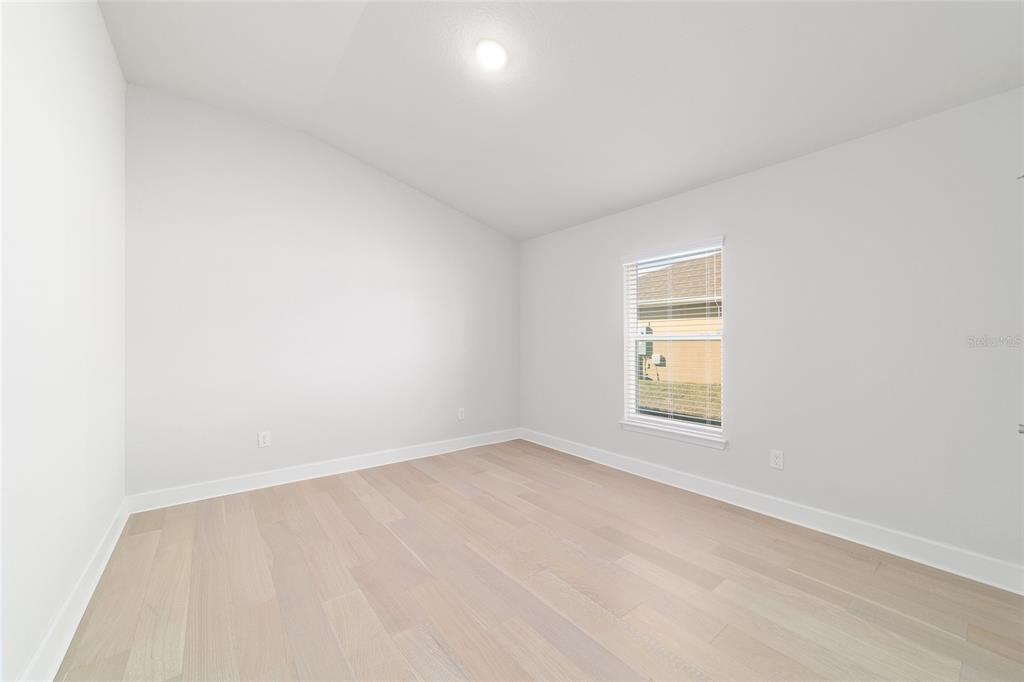 4373 Northeast 31st Street Ocala, FL 34470 - Photo 39 of 51 an empty room with a window