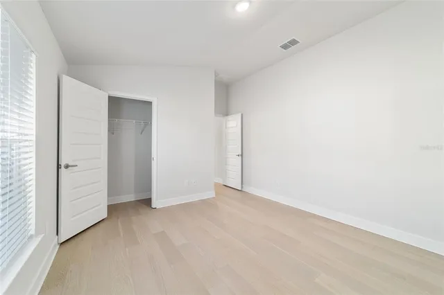 a view of an empty room and window