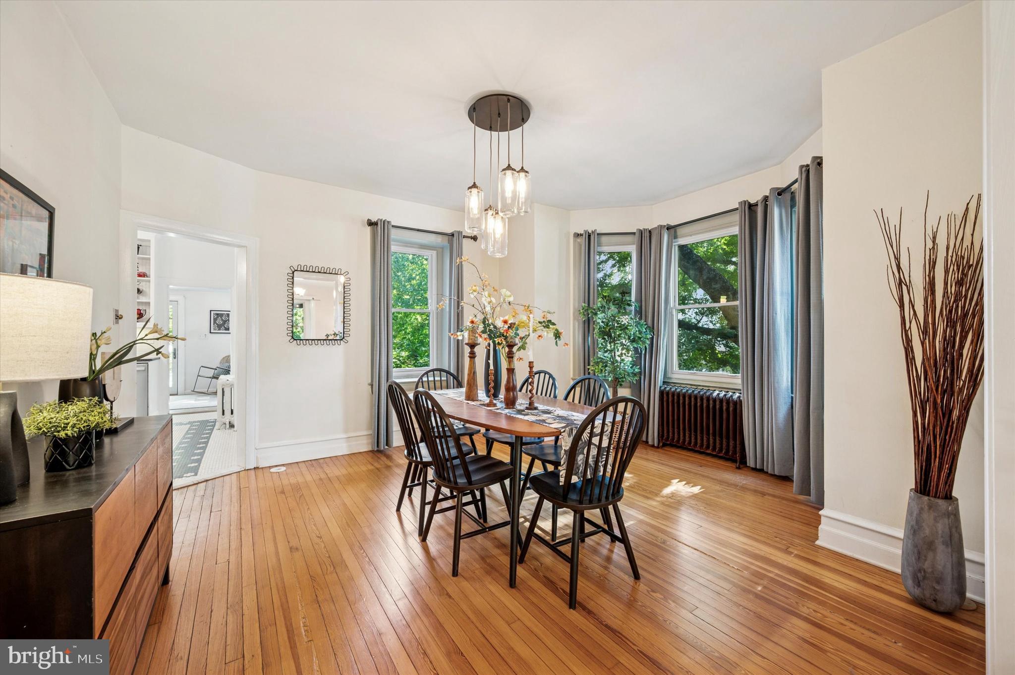 200 East Gravers Lane Philadelphia, PA 19118 - Photo 12 of 57 a view of a dining room with furniture window and wooden floor