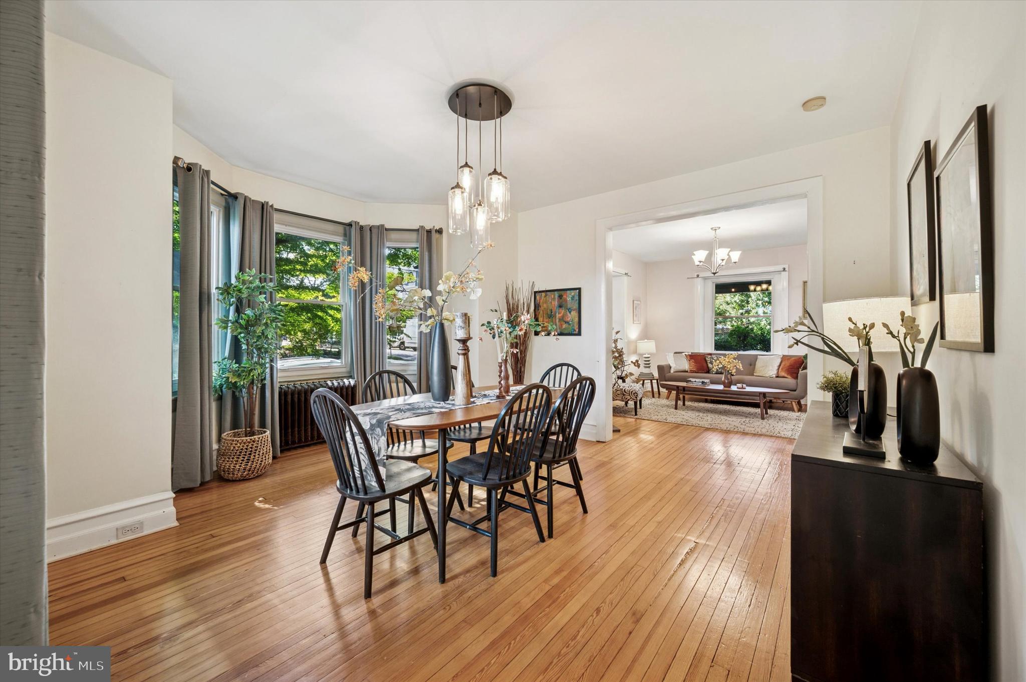 200 East Gravers Lane Philadelphia, PA 19118 - Photo 14 of 57 a view of a dining room with furniture window and wooden floor