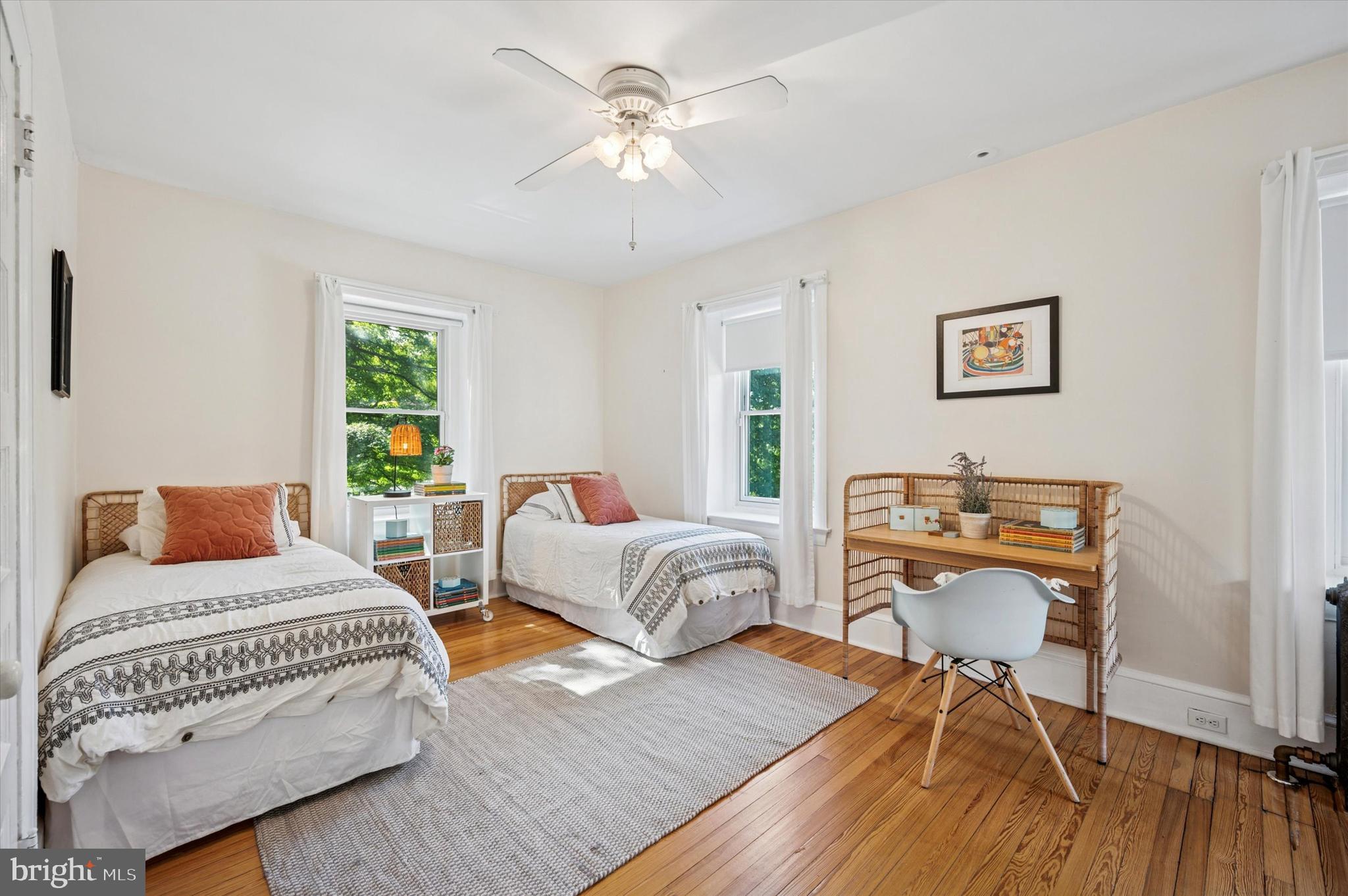 200 East Gravers Lane Philadelphia, PA 19118 - Photo 29 of 57 a bedroom with furniture and a wooden floor