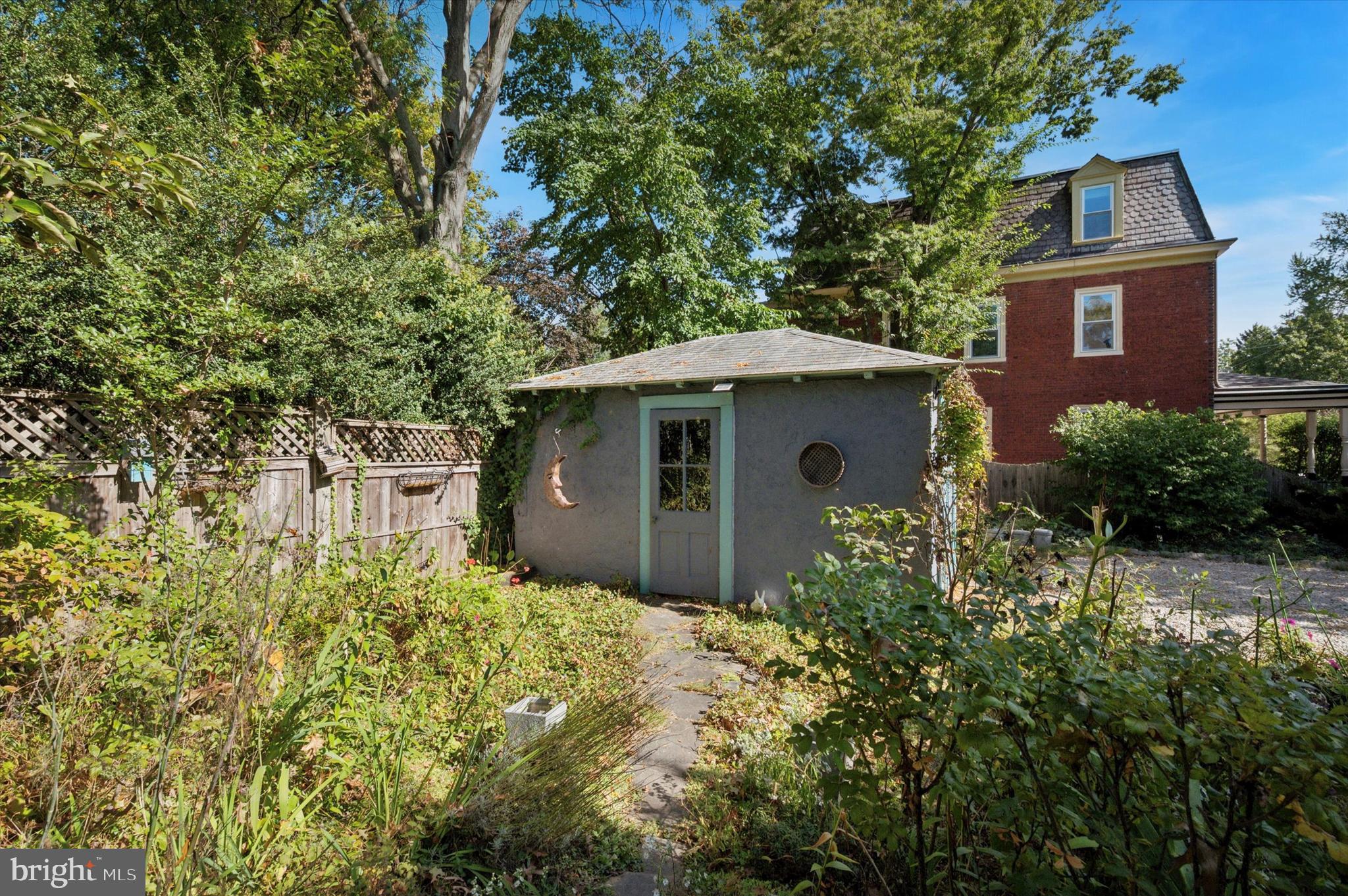 200 East Gravers Lane Philadelphia, PA 19118 - Photo 46 of 57 front view of a house with a yard