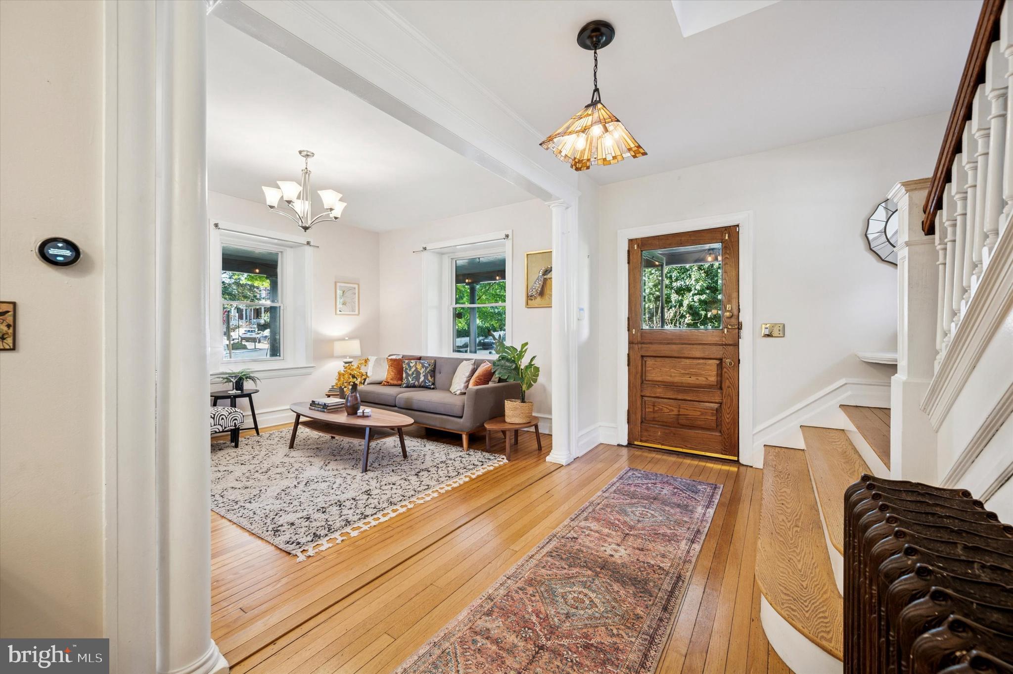 200 East Gravers Lane Philadelphia, PA 19118 - Photo 8 of 57 a living room with furniture and a chandelier