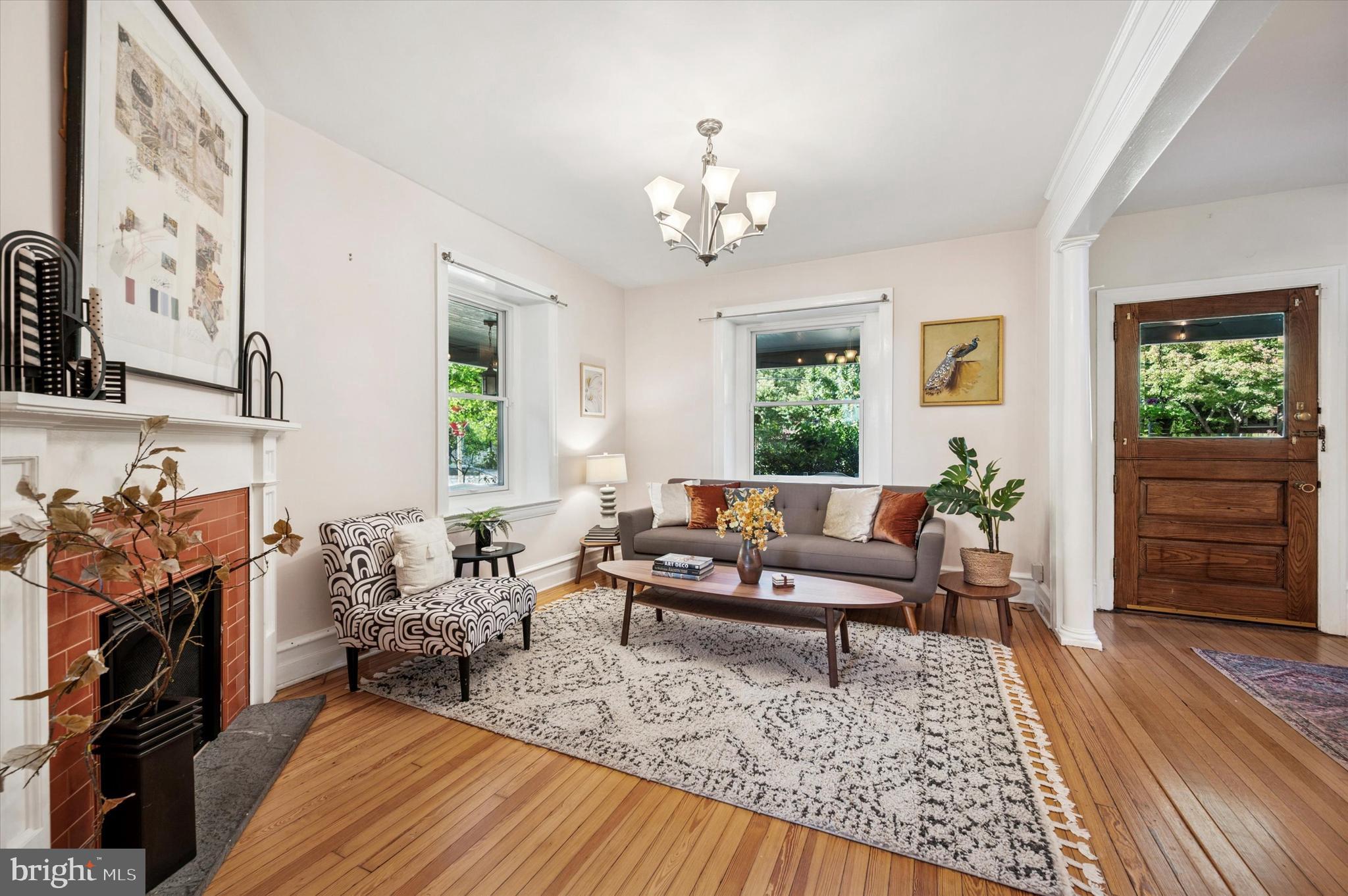 200 East Gravers Lane Philadelphia, PA 19118 - Photo 9 of 57 a living room with furniture and a fireplace