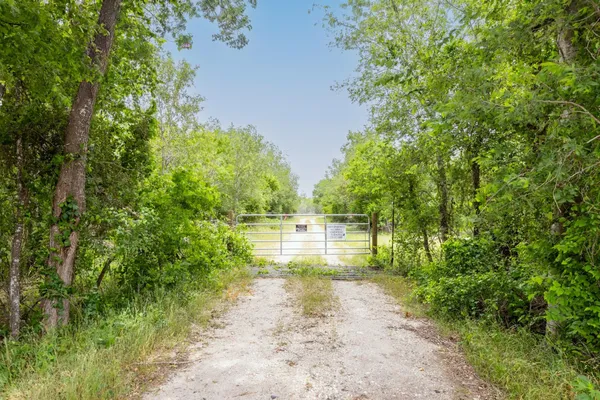 a view of a lake view with houses in back