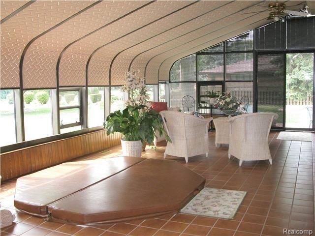 10890 Reeck Road Allen Park, MI 48101 - Photo 17 of 25 sunroom hot tub other way.jpg