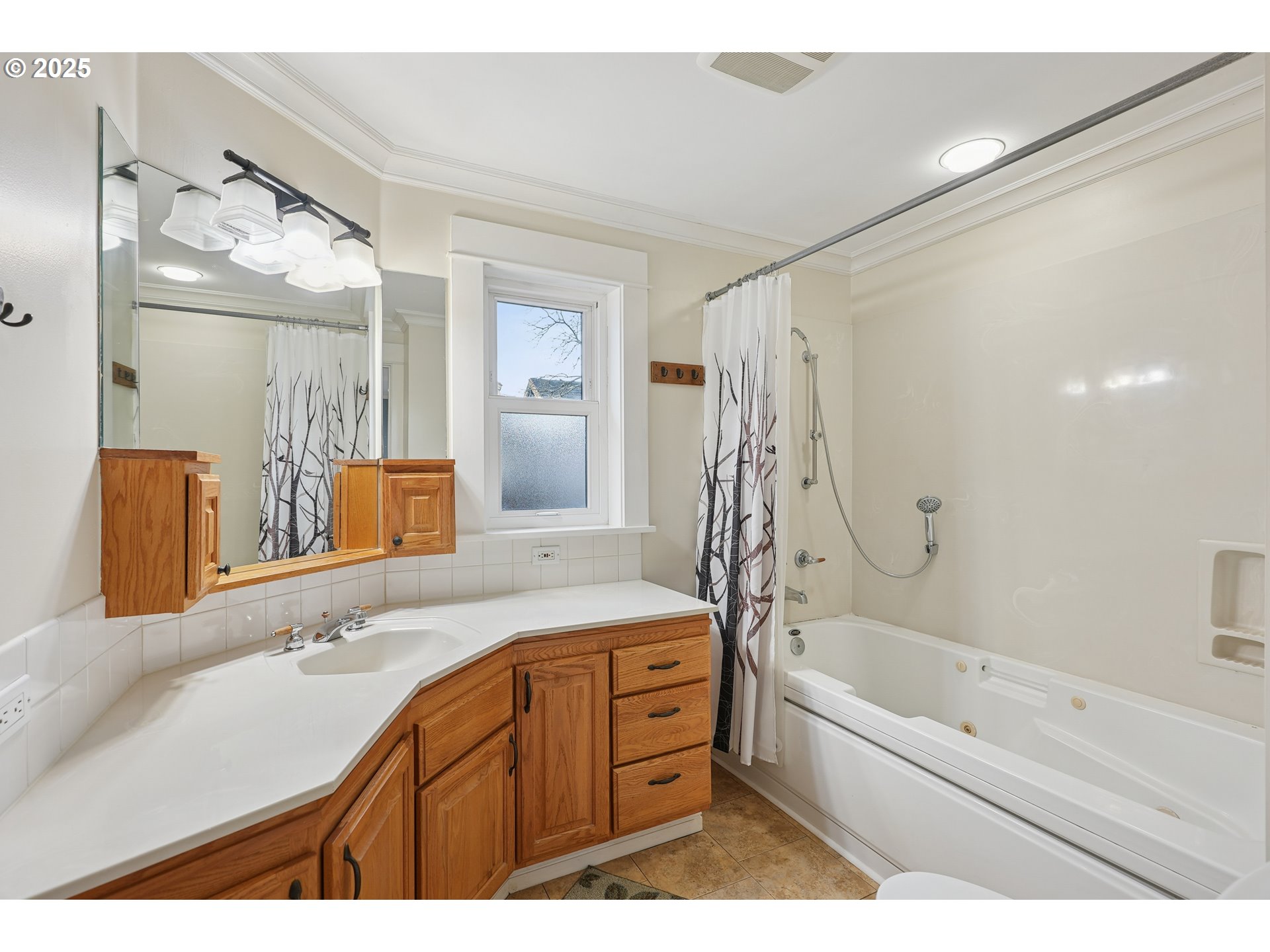 7521 North Jersey Street Portland, OR 97203 - Photo 12 of 18 a bathroom with a granite countertop sink a mirror a bathtub and shower
