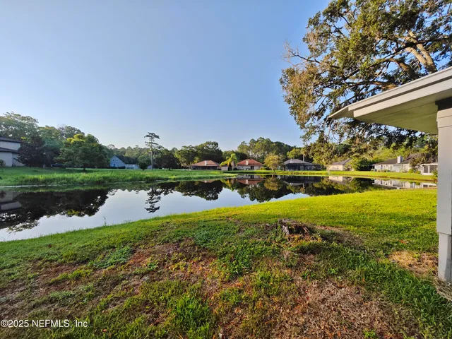 a view of a lake with outdoor space