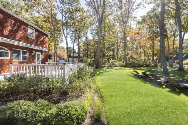 a view of a patio with a yard
