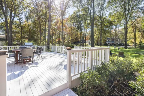 a view of entryway with stairs and wooden floor