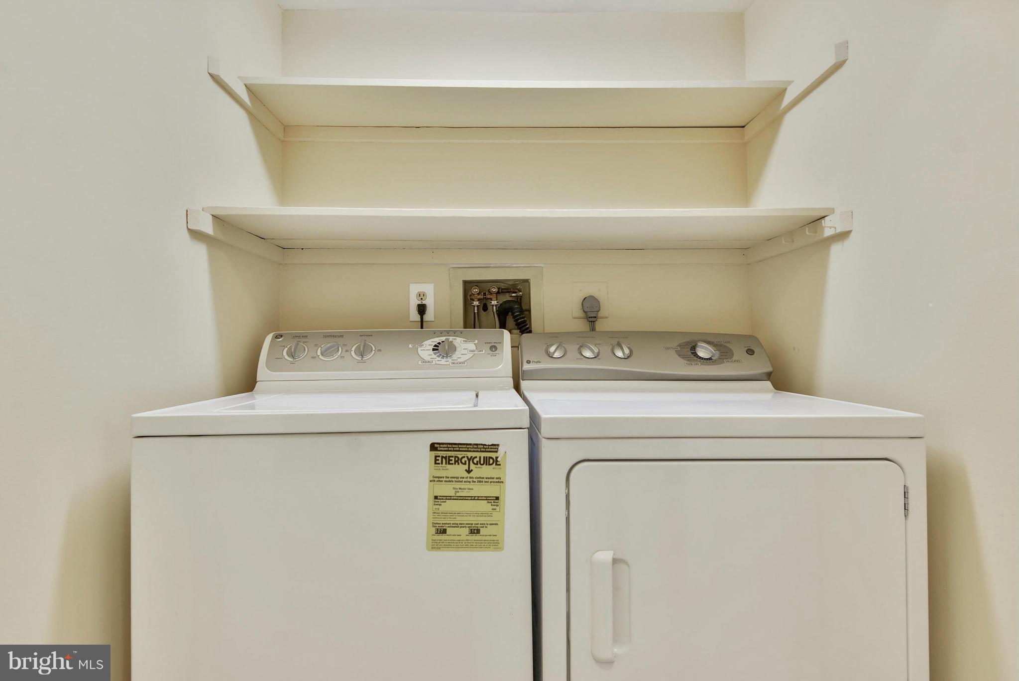 9503 Flower Avenue Silver Spring, MD 20901 - Photo 12 of 30 a utility room with dryer and washer