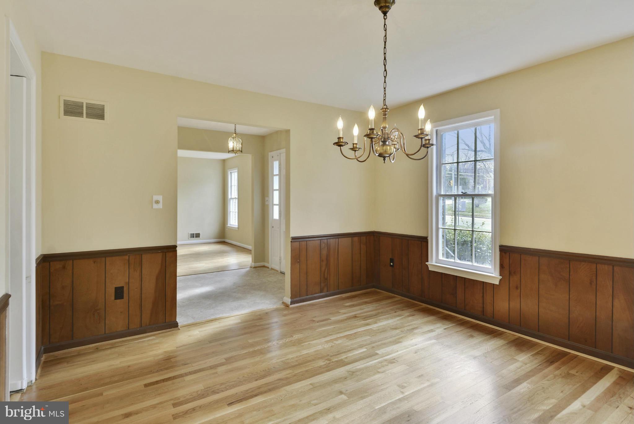 9503 Flower Avenue Silver Spring, MD 20901 - Photo 13 of 30 a view of livingroom with window and wooden floor