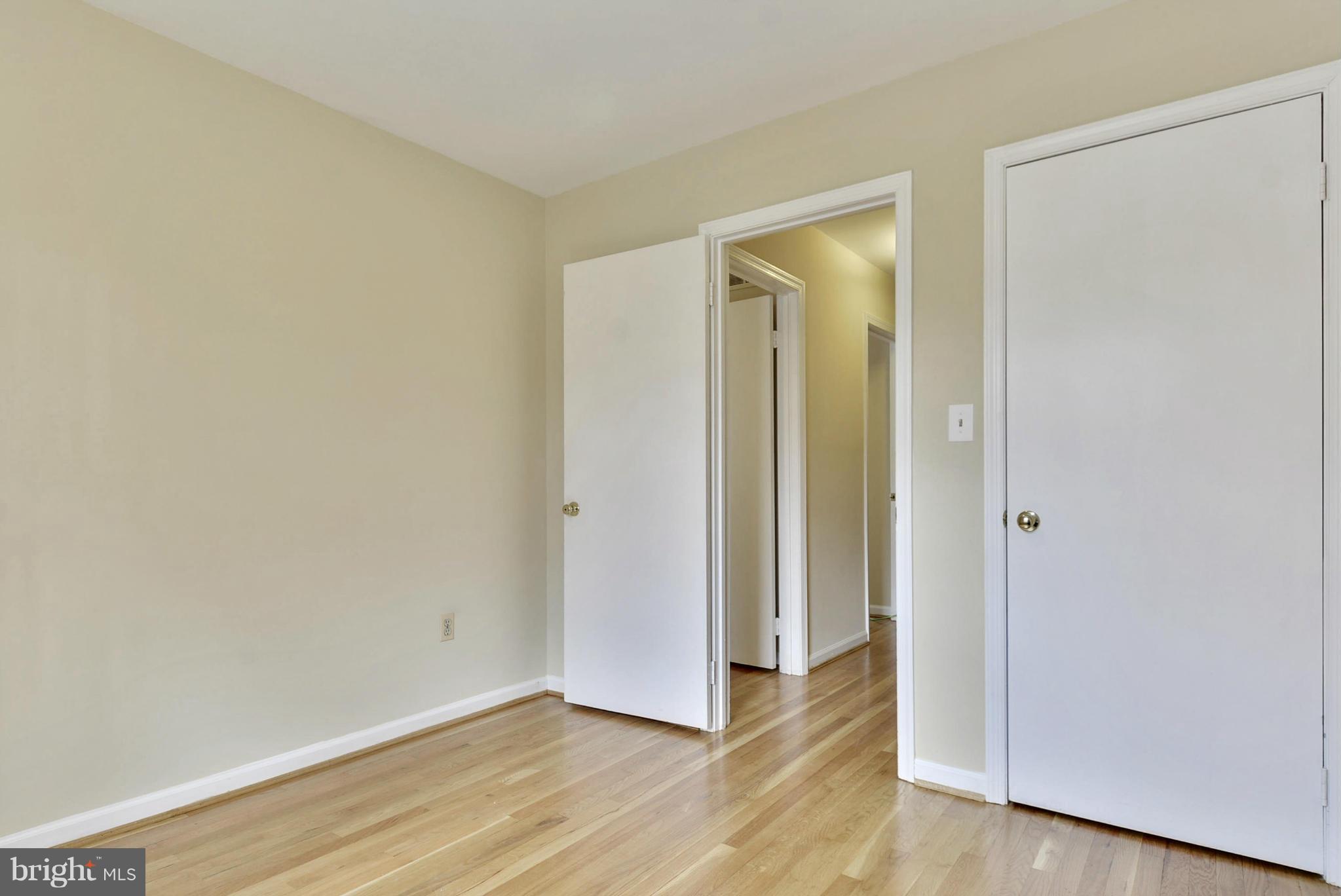 9503 Flower Avenue Silver Spring, MD 20901 - Photo 20 of 30 a view of an empty room and wooden floor