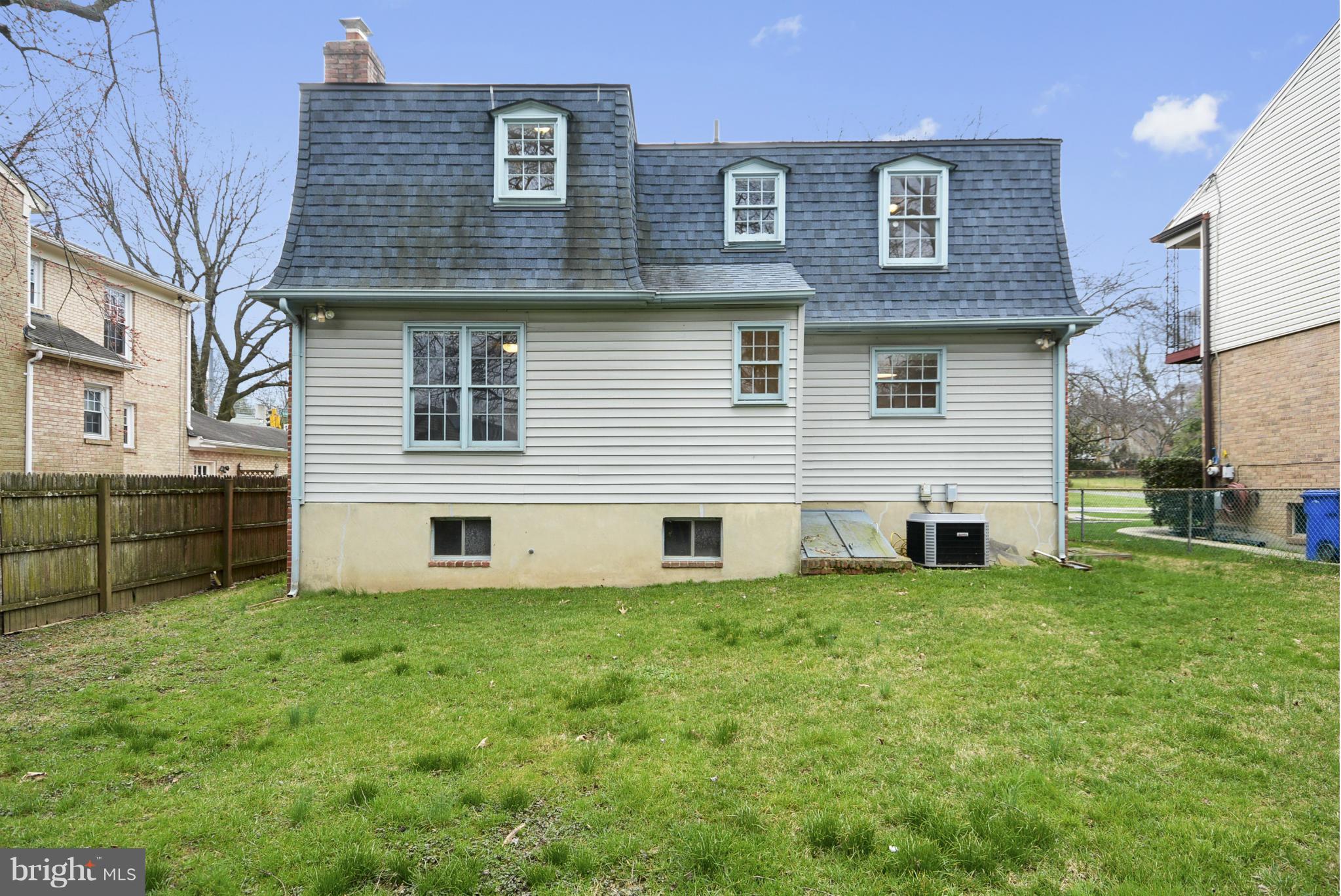 9503 Flower Avenue Silver Spring, MD 20901 - Photo 3 of 30 a house that has a lot of windows in it