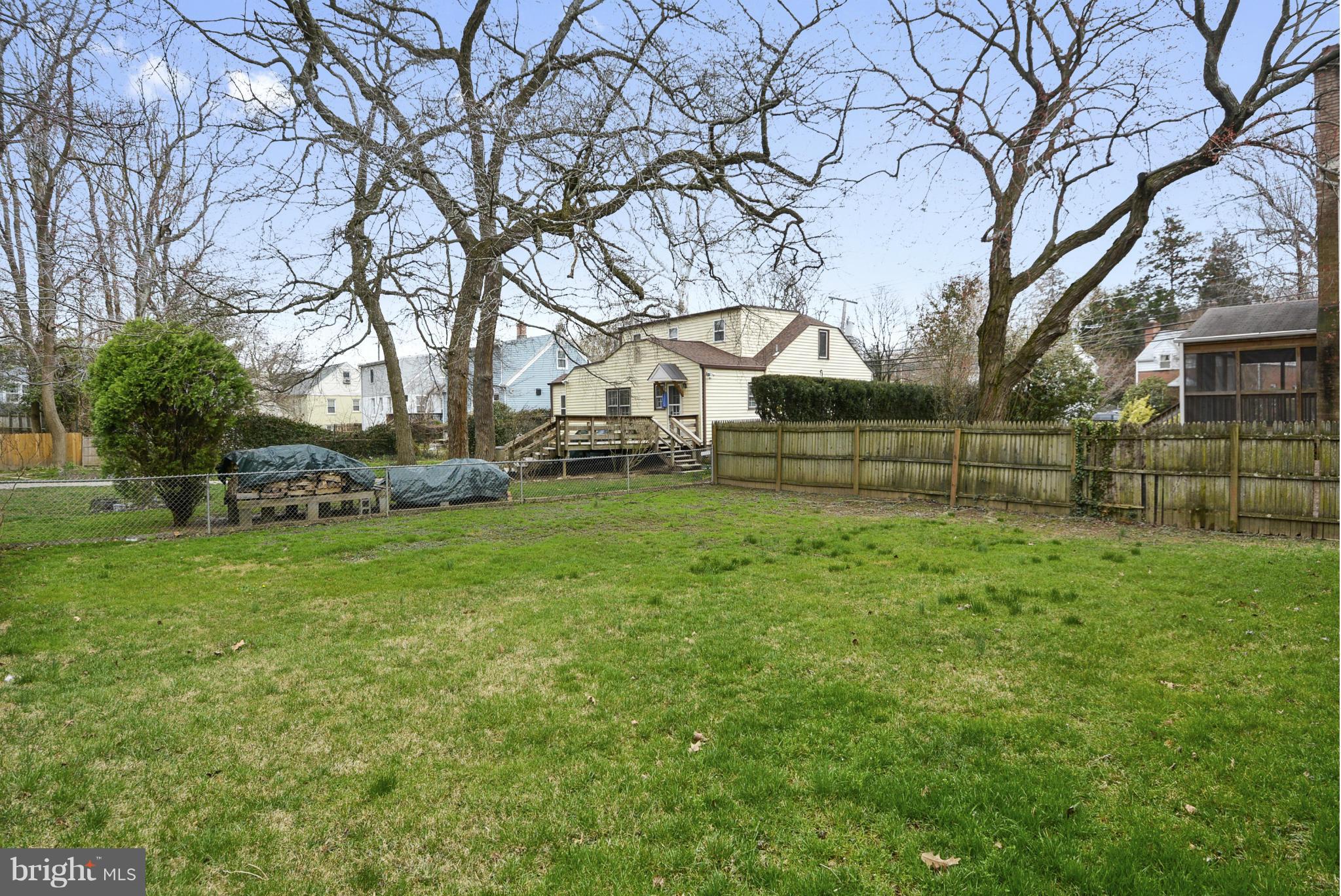 9503 Flower Avenue Silver Spring, MD 20901 - Photo 4 of 30 a view of a house with a back yard