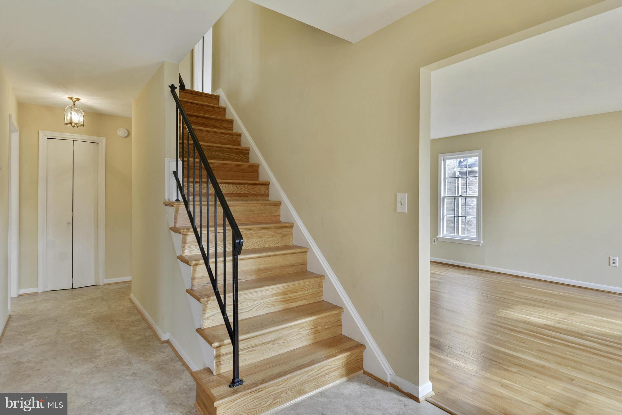 9503 Flower Avenue Silver Spring, MD 20901 - Photo 6 of 30 a view of an entryway with wooden floor