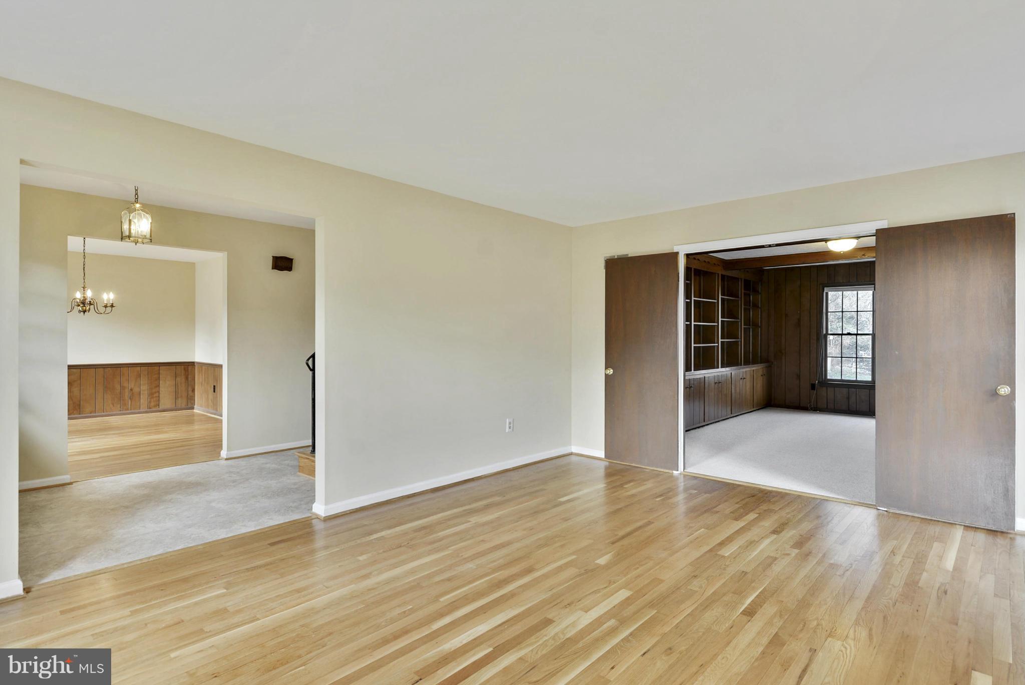9503 Flower Avenue Silver Spring, MD 20901 - Photo 7 of 30 wooden floor in an empty room
