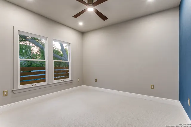 an empty room with windows