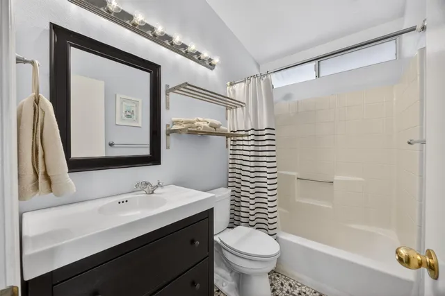 a view of a house with a back yard