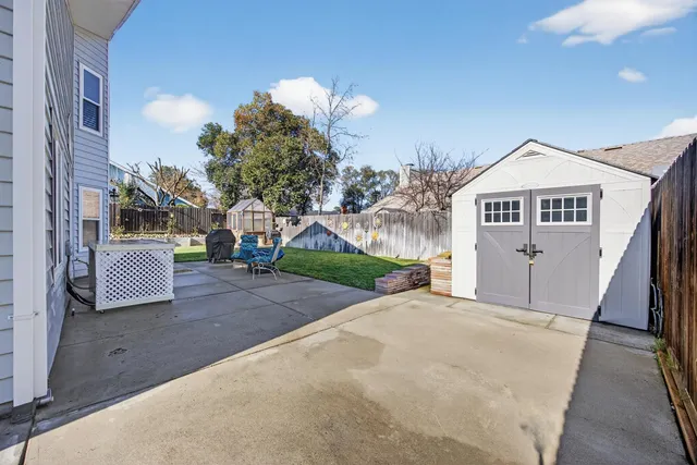 a aerial view of a house with a yard