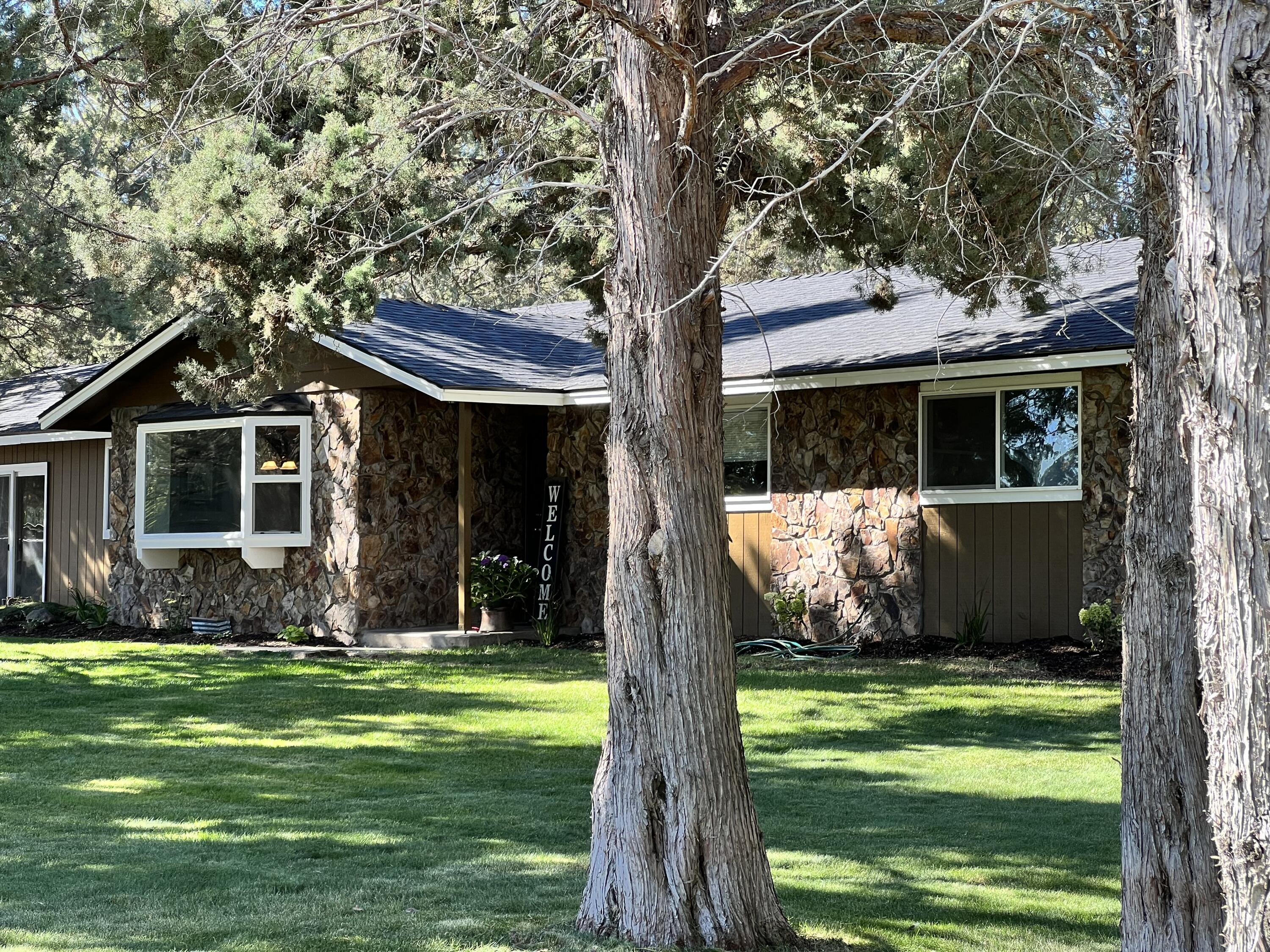 64570 Research Road Bend, OR 97703 - Photo 16 of 60 a view of a house with backyard