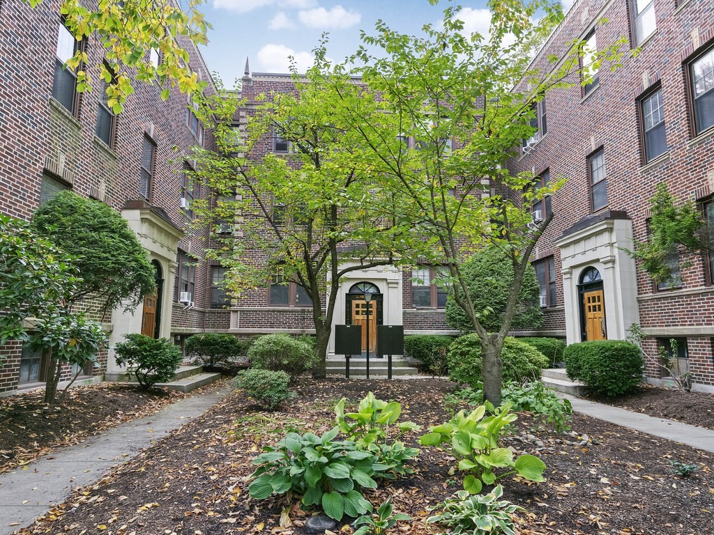 31 Winslow Road, Unit 6 Brookline, MA 02446 - Photo 1 of 18 a front view of a house with garden
