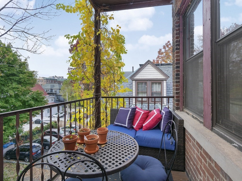 31 Winslow Road, Unit 6 Brookline, MA 02446 - Photo 15 of 18 a view of city from balcony with furniture