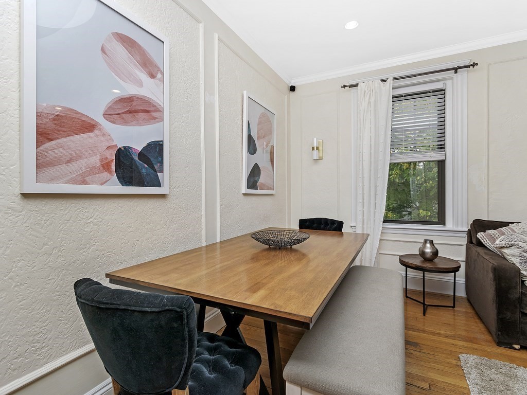 31 Winslow Road, Unit 6 Brookline, MA 02446 - Photo 5 of 18 a view of a dining room with furniture window and outside view