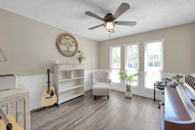 a view of livingroom with furniture and wooden floor