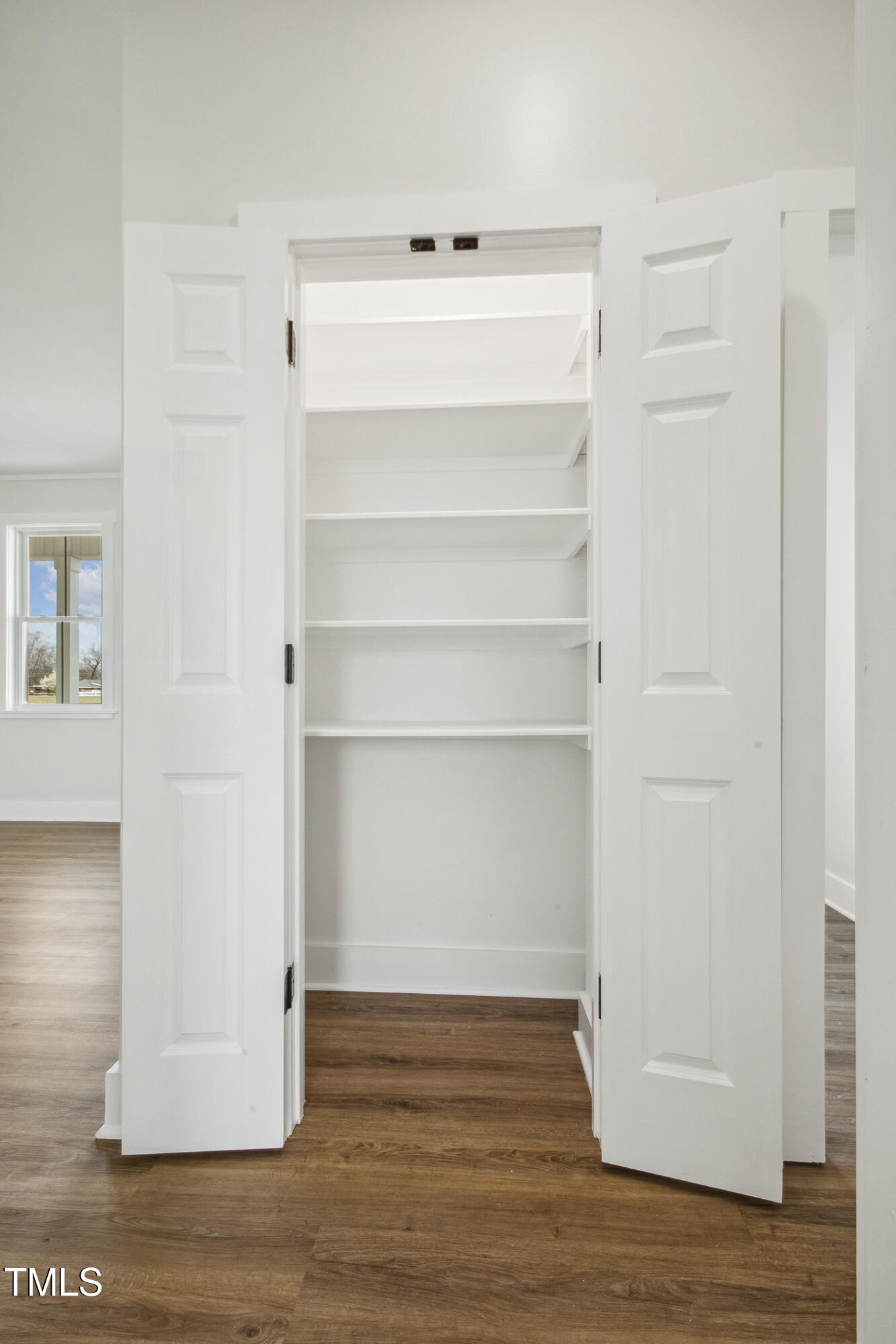 233 Surles Road Benson, NC 27504 - Photo 23 of 57 a view of a room with wooden floor
