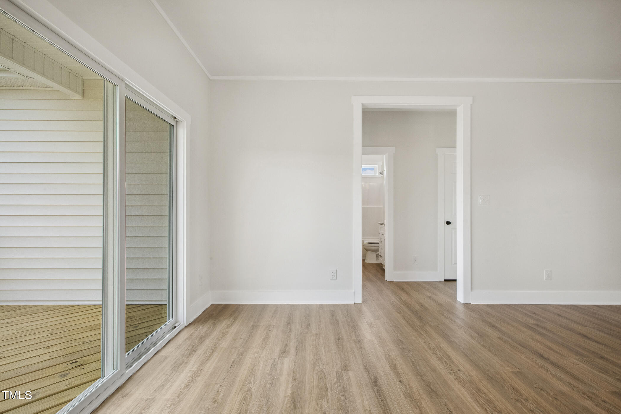 233 Surles Road Benson, NC 27504 - Photo 26 of 57 a view of a hallway with wooden floor and closet