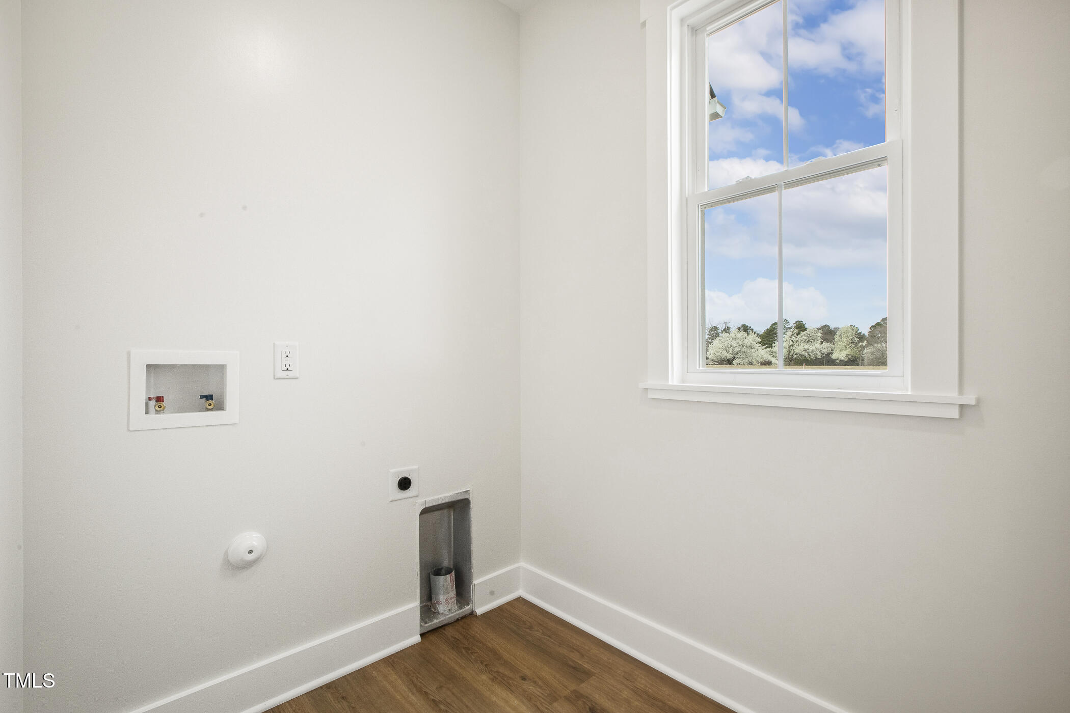 233 Surles Road Benson, NC 27504 - Photo 42 of 57 a view of a small space with wooden floor and a window